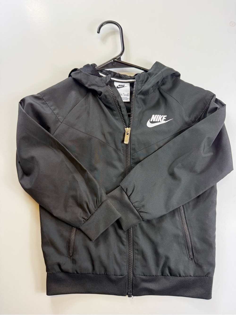 Nike Kids Black Hooded Rain Jacket with White Logo